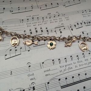 Goldtone Lucky Charm Bracelet with Green Gemstone